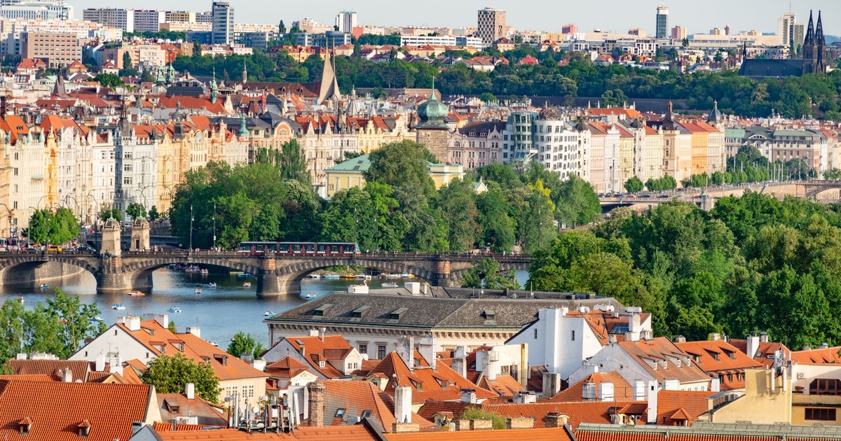 Explore the historic charm of Prague's bridges and architecture with this stunning aerial cityscape.